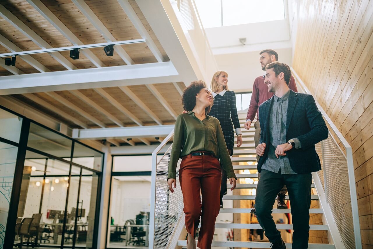 Community members on an office staircase